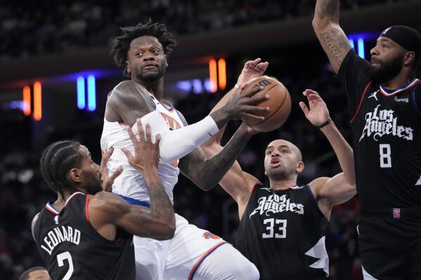 Leonard has 35 points Clippers outlast Knicks 134 128 in OT AP News